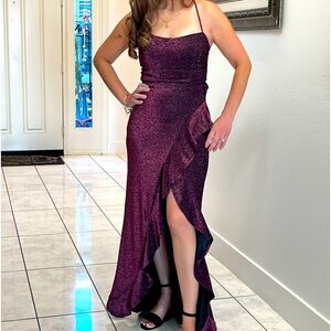 maroon color, stretchable glittery materials. professionally cleaned, wore once.